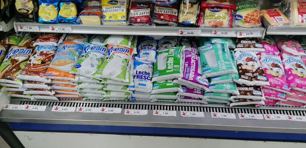 Different brands of milk in Bolivia and their prices 0.25 gal bags